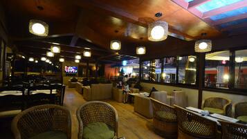 Breakfast, lunch, dinner served; Italian cuisine, garden views