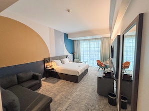 Habitación Premium, 1 cama King size y sofá cama | Ropa de cama hipoalergénica y caja de seguridad en la habitación