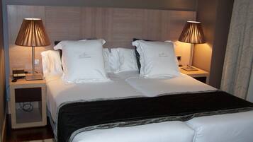 Egyptian cotton sheets, premium bedding, down duvets, minibar