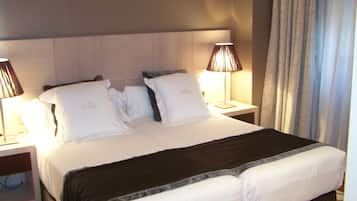 Egyptian cotton sheets, premium bedding, down duvets, minibar