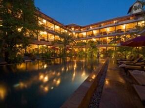 Outdoor pool, open 6:00 AM to 10:00 PM, pool umbrellas, sun loungers