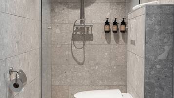 Varvsrum | Bathroom | Shower, free toiletries, hair dryer, bathrobes