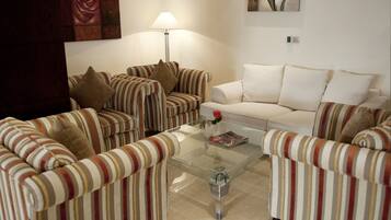 Suite Exécutive | Salle de séjour | Télévision