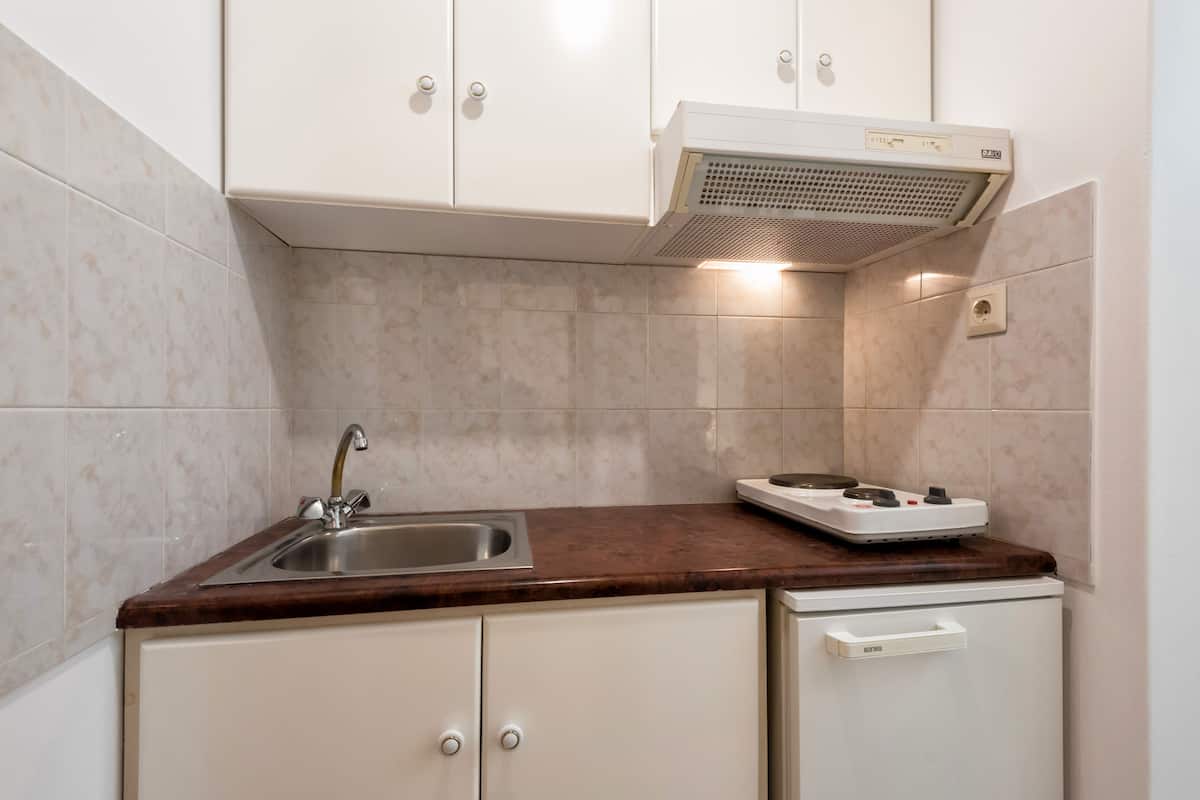 premium bedding, down duvets, memory-foam beds, in-room safe