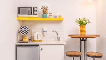 Departamento familiar, 2 habitaciones | Cocineta privada | Microondas y tetera eléctrica