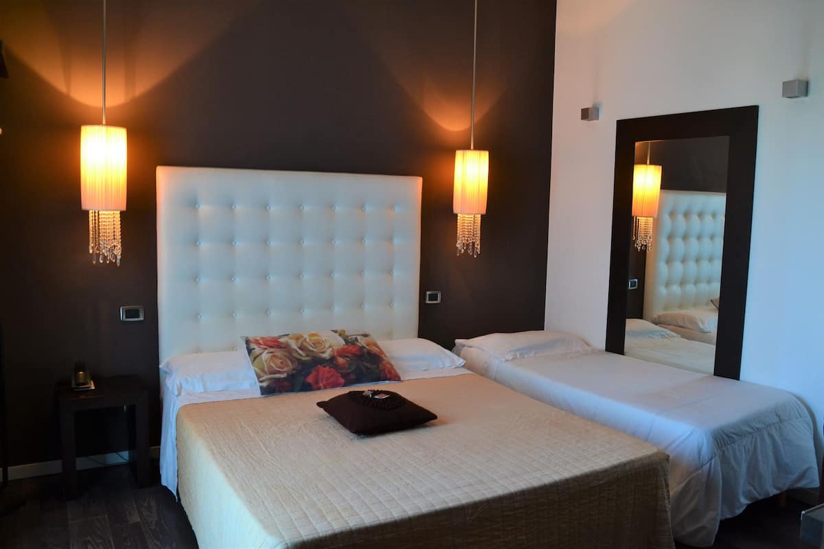 Family Triple Room, Terrace | Down comforters, minibar, in-room safe, desk