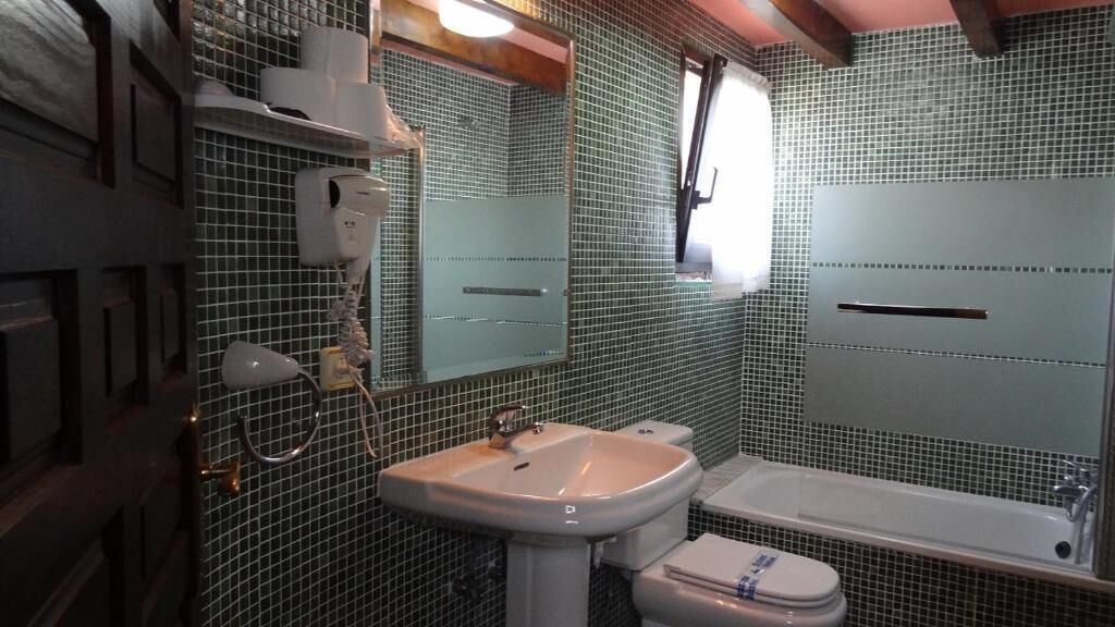 basic twin room | bathroom | hair dryer, towels