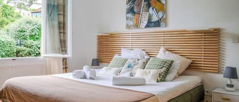 Superior Double Room, Garden View | Minibar, in-room safe, iron/ironing board, free WiFi