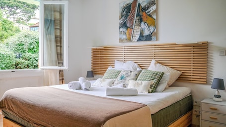 Superior Double Room, Garden View | Minibar, in-room safe, iron/ironing board, free WiFi