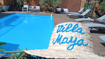 2 outdoor pools, open 7:30 AM to 11:00 PM, pool umbrellas, pool loungers