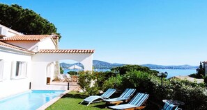 2 outdoor pools, open 7:30 AM to 11:00 PM, pool umbrellas, pool loungers