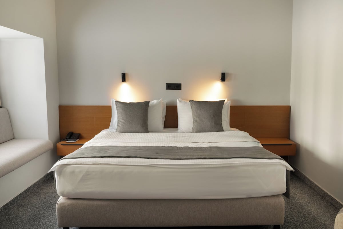 Premium bedding, down duvets, memory-foam beds, minibar