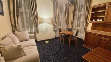 Comfort Apartment | Living area | 32-inch flat-screen TV with digital channels, TV