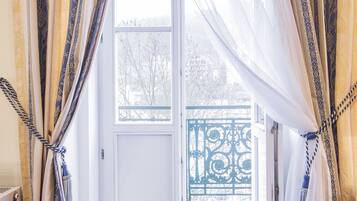 In-room safe, desk, blackout curtains, iron/ironing board