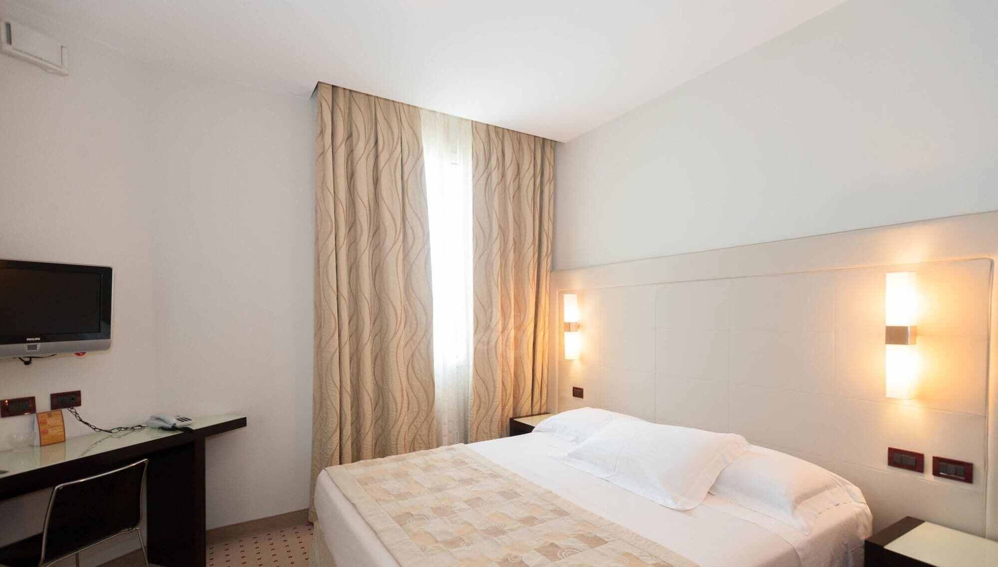 Premium bedding, in-room safe, desk, soundproofing