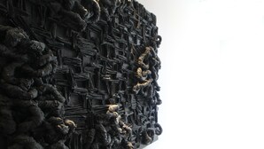 A textured wall with a complex, abstract design. - Hotel Indipendenza (Rome)
