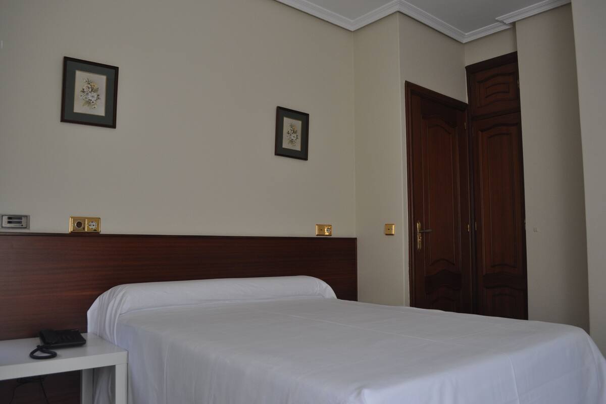 Blackout curtains, rollaway beds, free WiFi