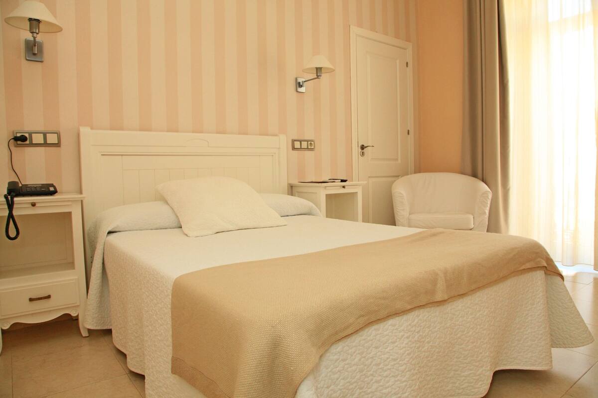 double or twin room | in-room safe, individually decorated, desk, blackout curtains