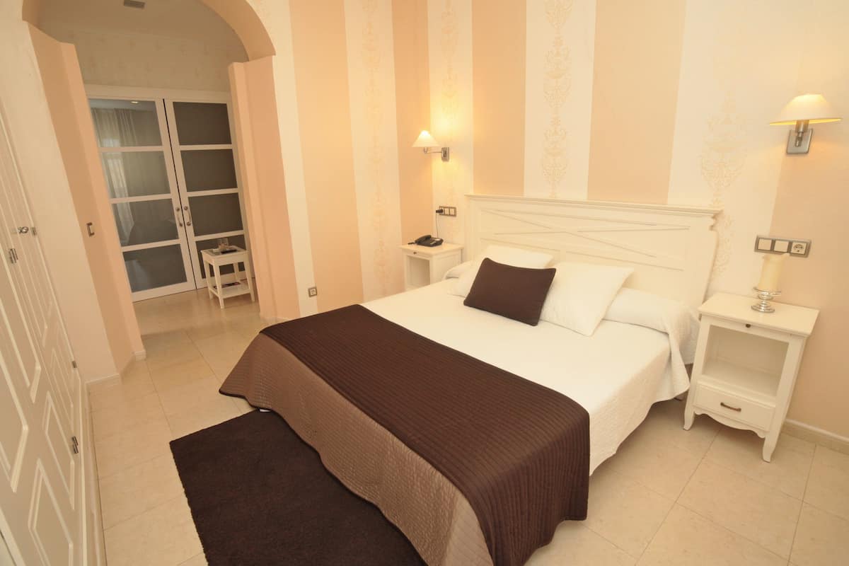 junior suite, city view | in-room safe, individually decorated, desk, blackout curtains