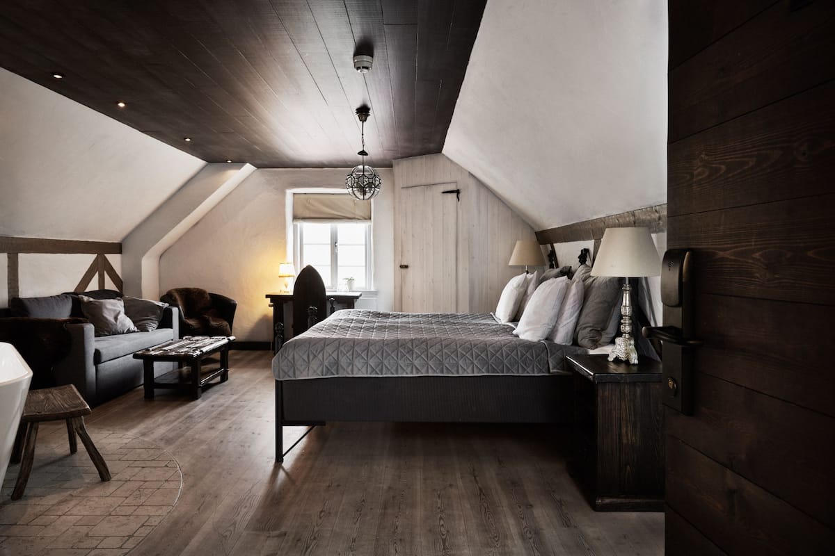 Deluxe studio suite | Luxe beddengoed, een minibar, een kluis op de kamer