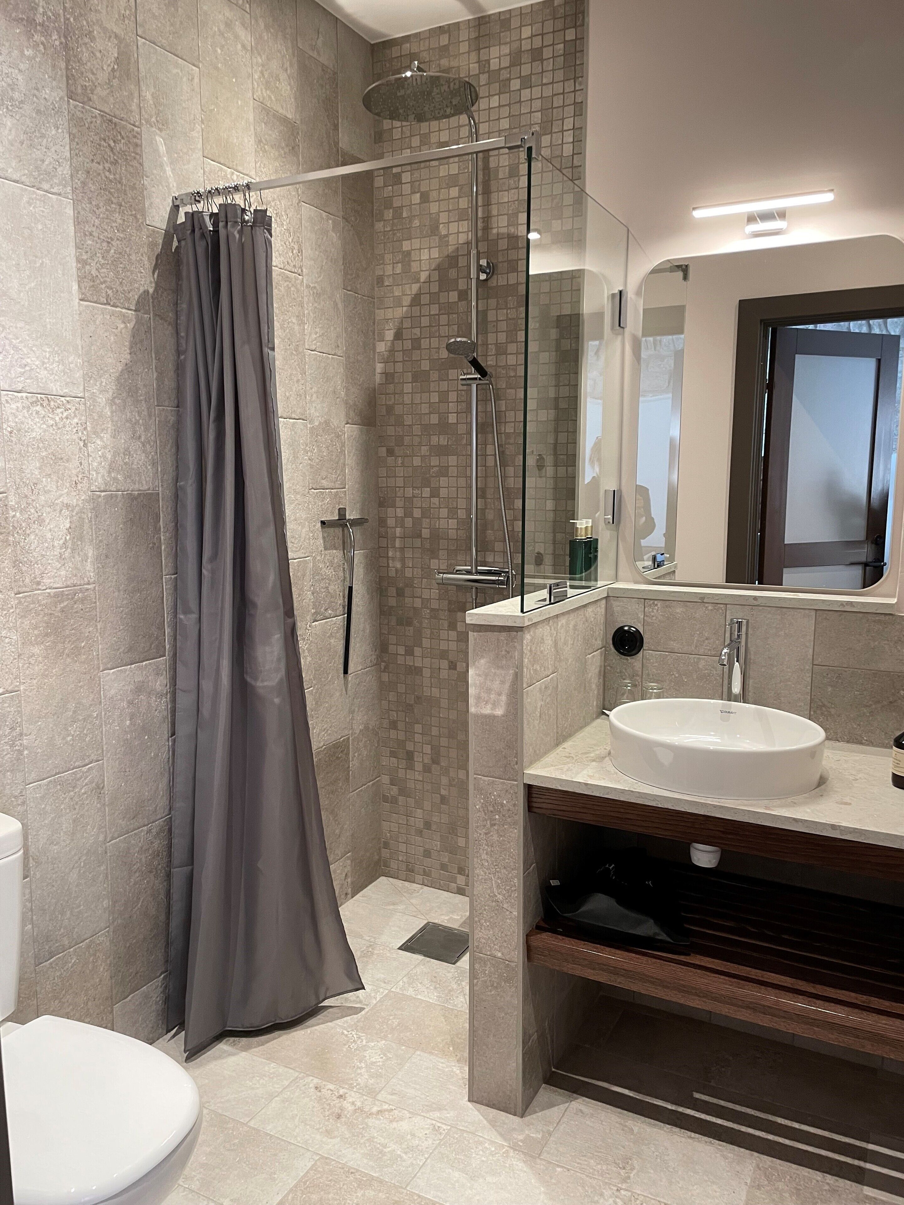 deluxe studio | bathroom | shower, designer toiletries, hair dryer, heated floors