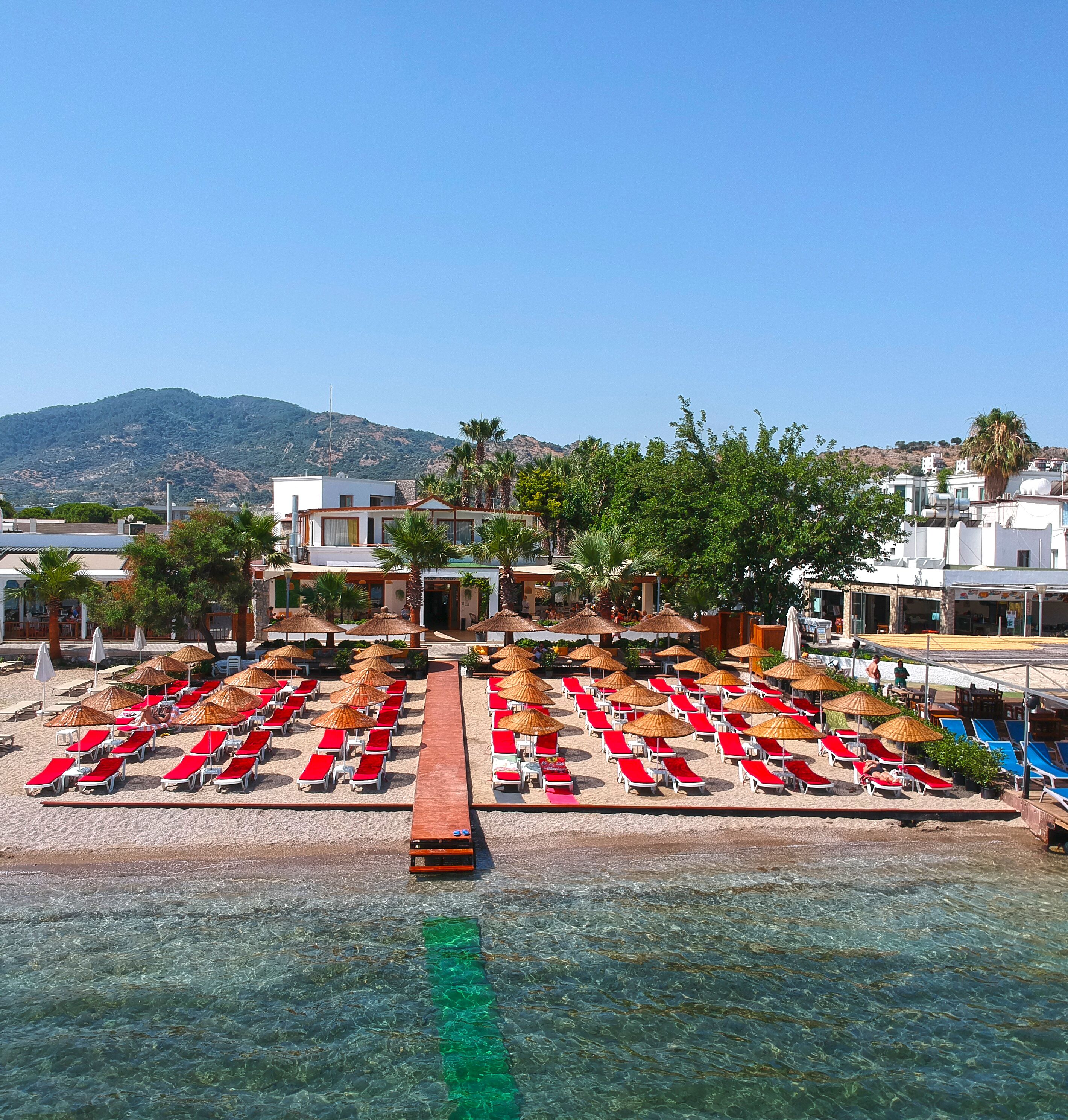 on the beach, sun-loungers, beach umbrellas