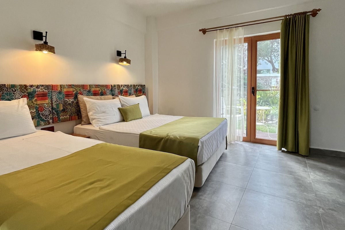standard triple room | in-room safe, free wifi, bed sheets, wheelchair access