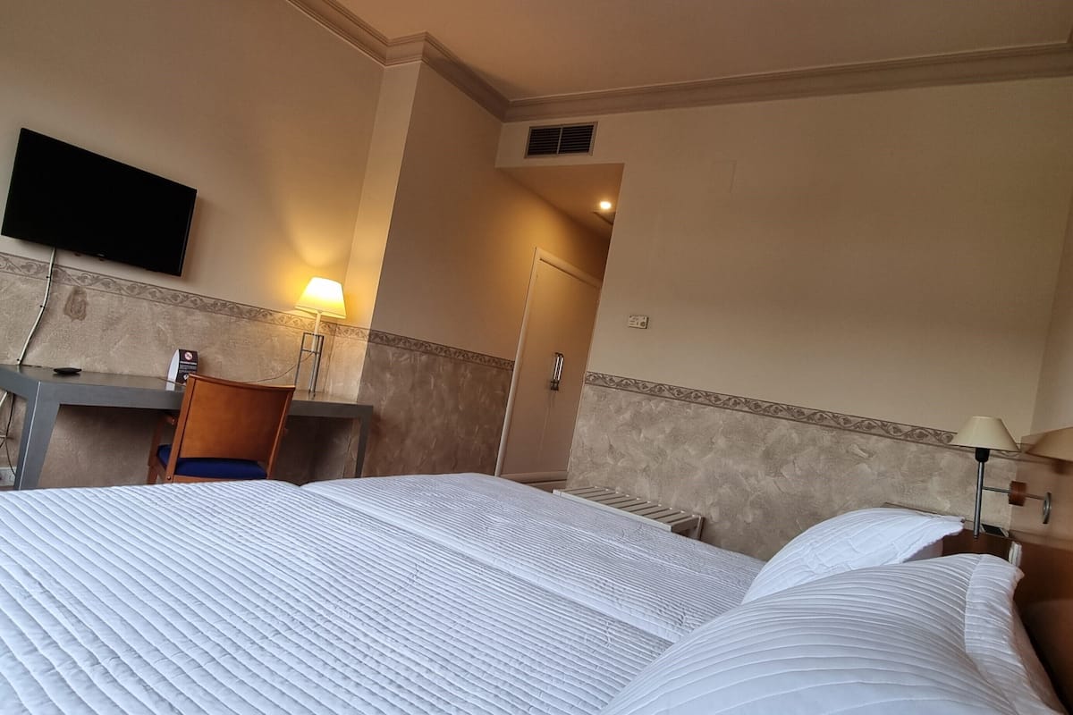 double or twin room | in-room safe, desk, blackout curtains, free cots/infant beds