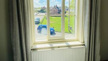 Desk, laptop workspace, blackout drapes, free WiFi