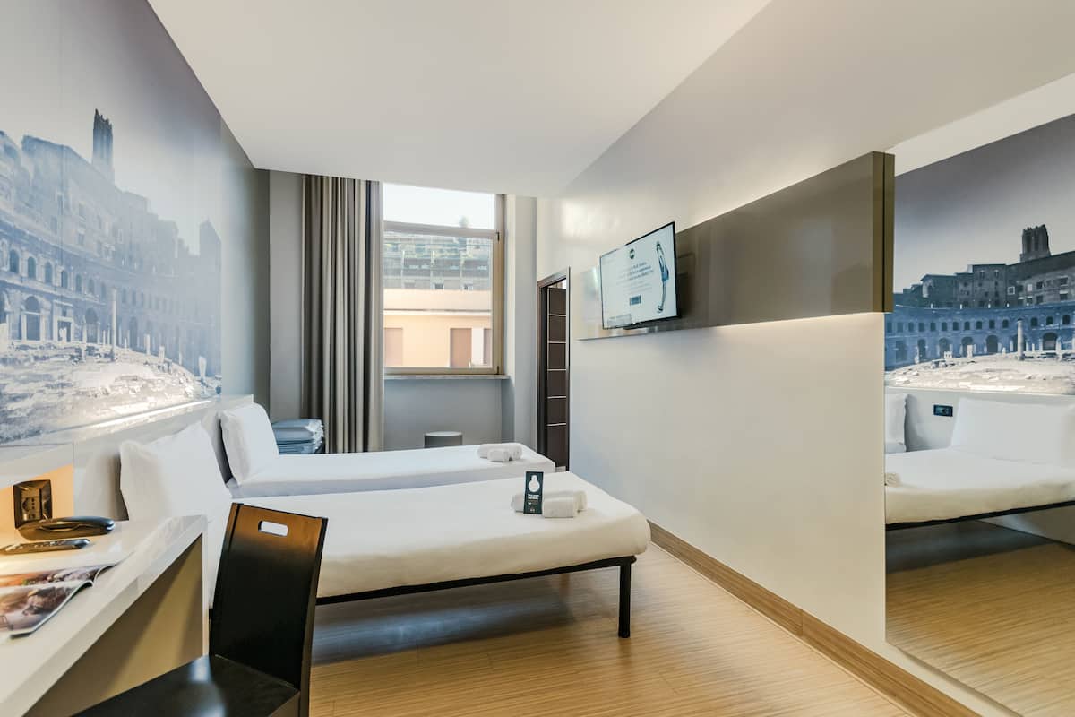 Twin Room, Non Smoking | In-room safe, desk, iron/ironing board, free WiFi