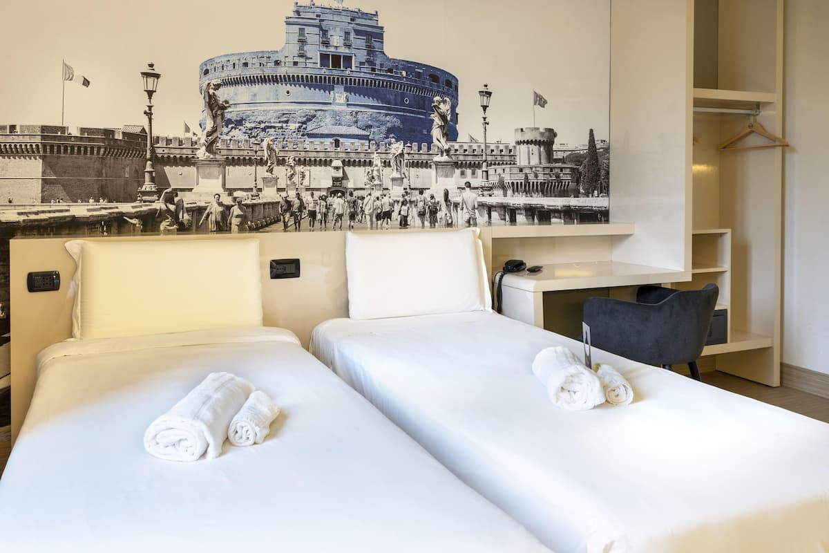 Twin Room, Non Smoking | In-room safe, desk, iron/ironing board, free WiFi