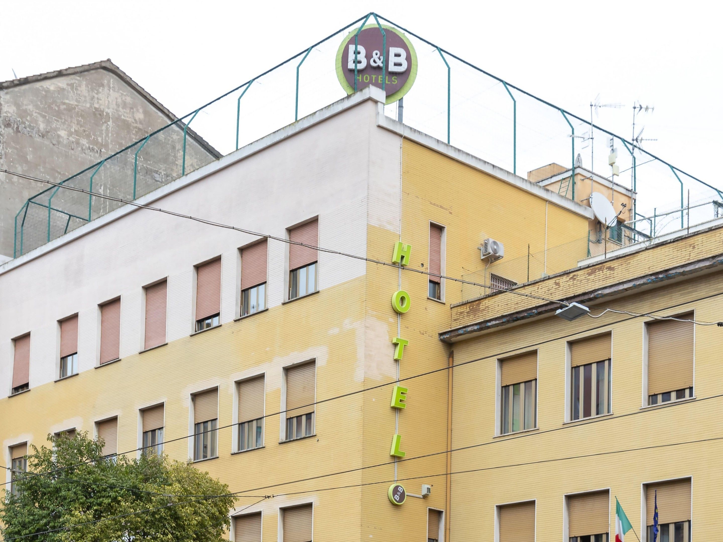 A hotel building with a sign indicating it is a B&B.