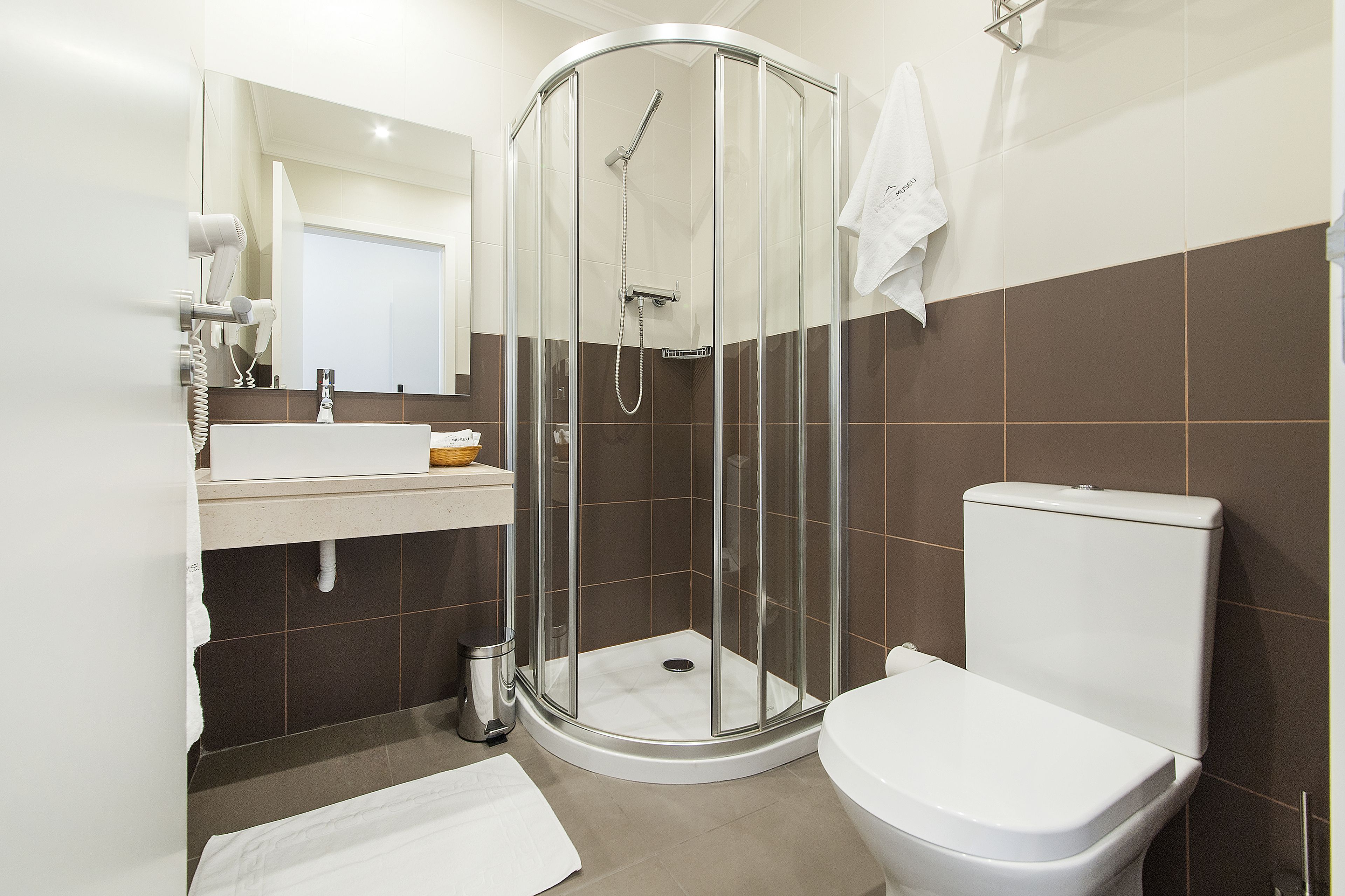 comfort triple room, river view | bathroom | rainfall showerhead, hair dryer, bidet, towels