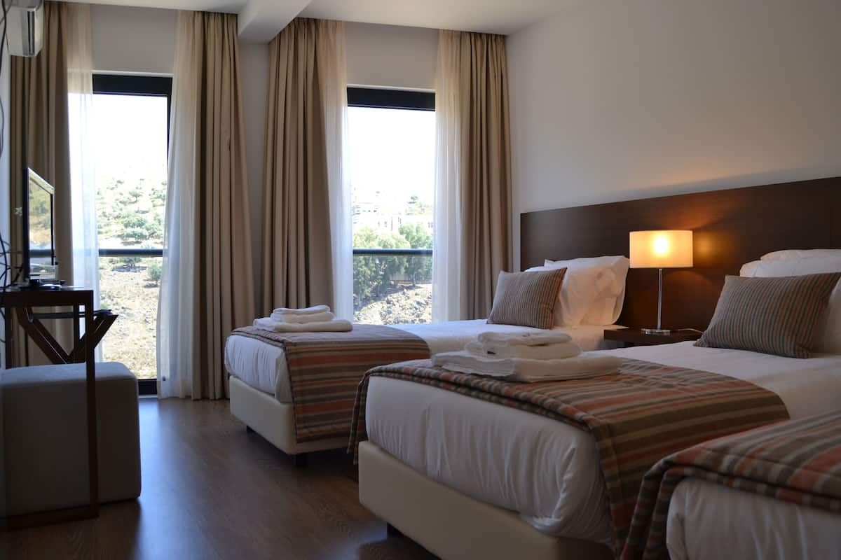 comfort triple room, river view | down duvets, desk, blackout curtains, soundproofing