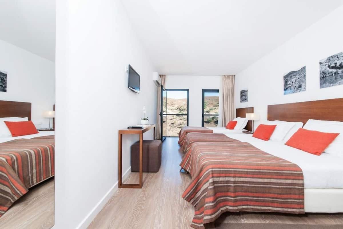 Down duvets, desk, blackout curtains, soundproofing