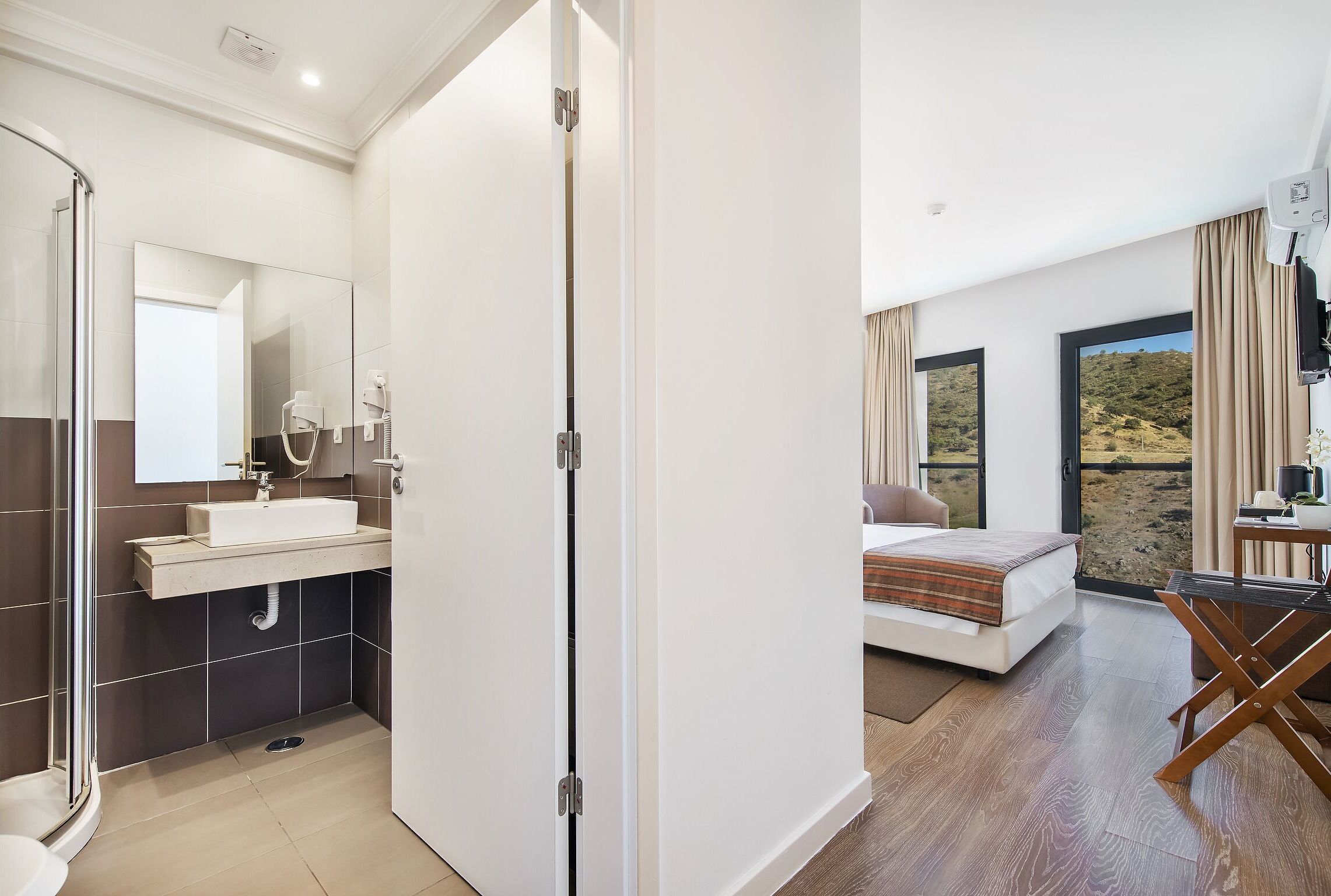 Down duvets, desk, blackout curtains, soundproofing