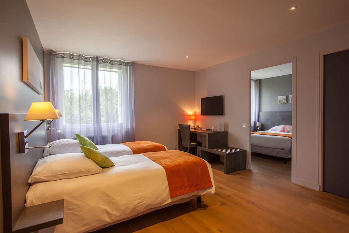 cozy quadruple room | in-room safe, desk, soundproofing, free cots/infant beds