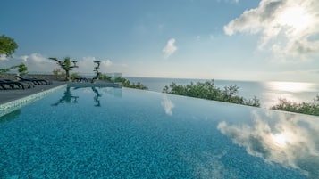 2 outdoor pools, pool umbrellas, sun loungers