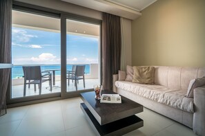 Superior Suite, Sea View (For 2) | Living area | 32-inch LCD TV with satellite channels, TV, DVD player - Kymothoe Elite Suites (Zakynthos)