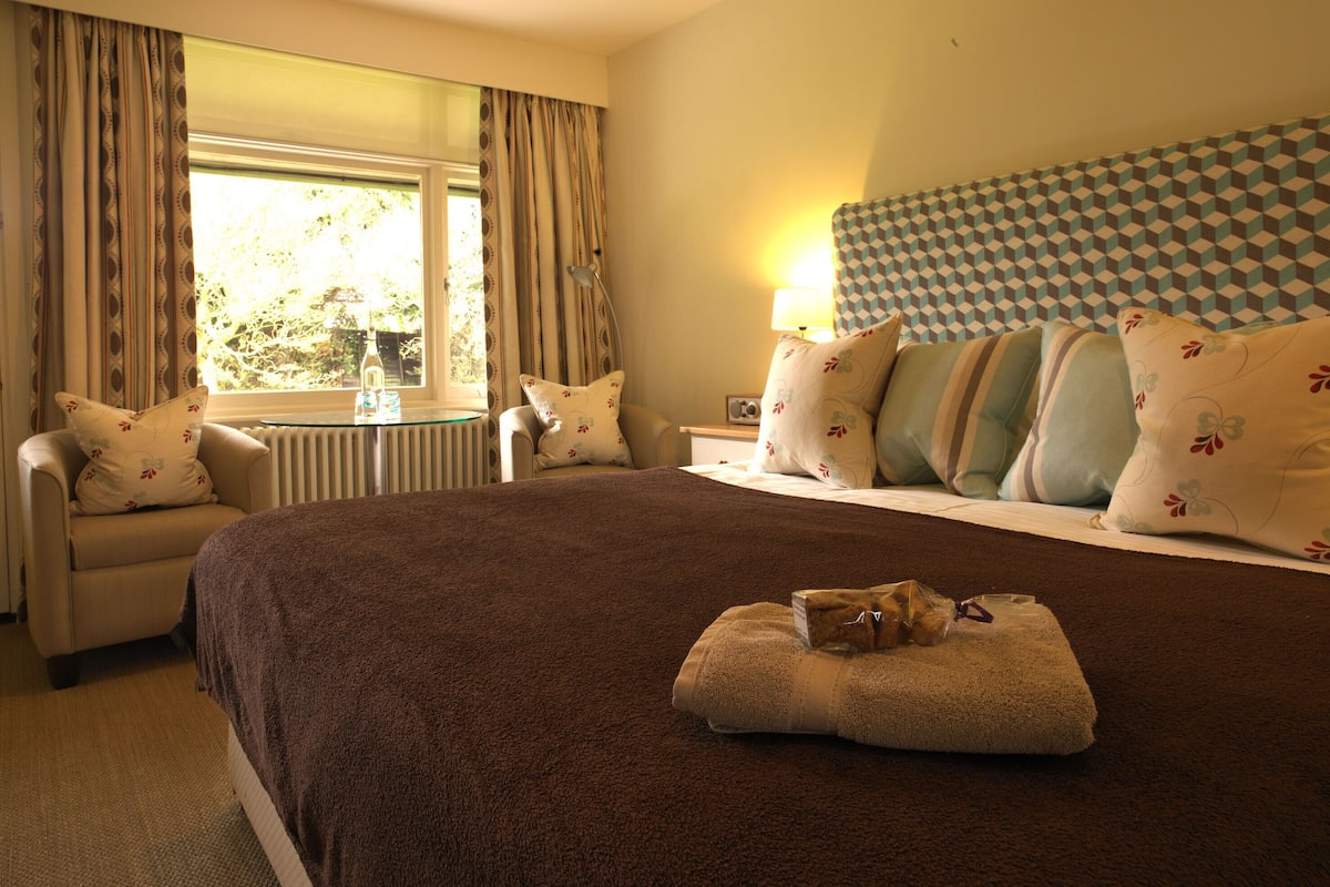 Klassieke tweepersoonskamer, 1 tweepersoonsbed (Garden Double Room) | 1 slaapkamer, een strijkplank/strijkijzer, gratis wifi, beddengoed
