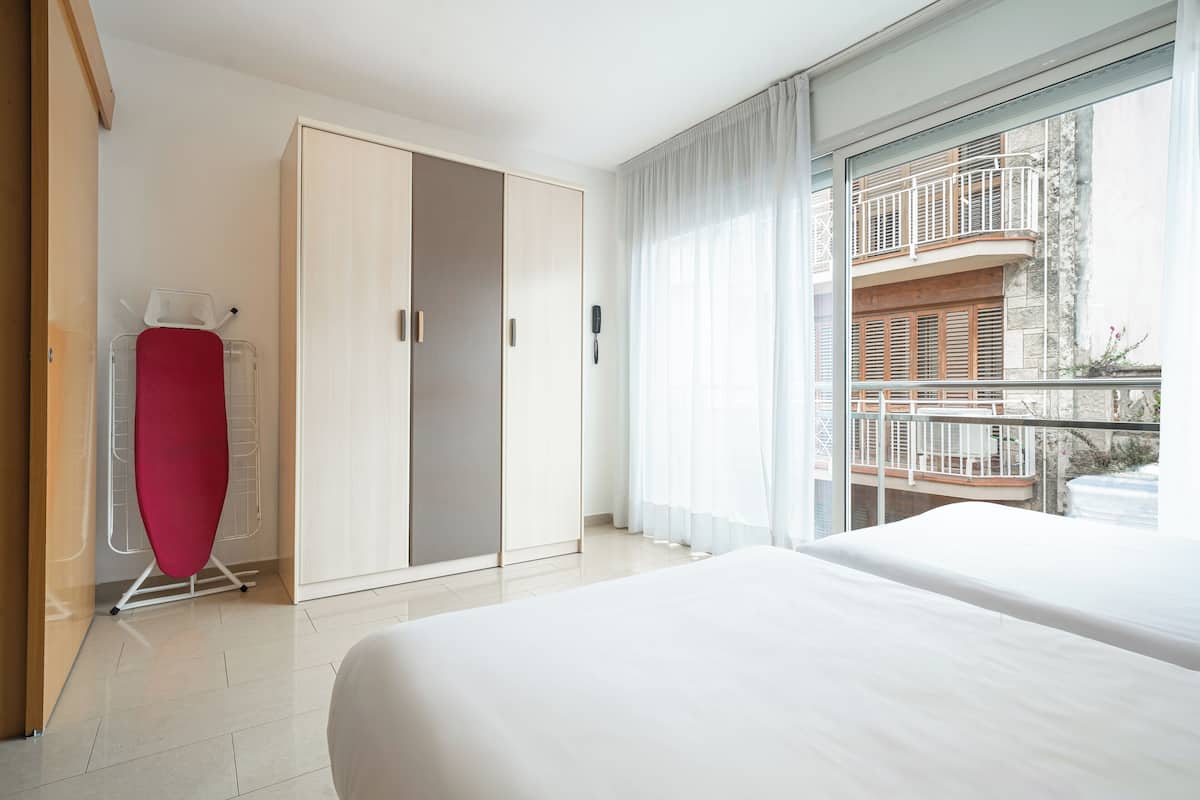 Apartment, 1 Bedroom (2-4 adults) | 1 bedroom, laptop workspace, soundproofing, iron/ironing board