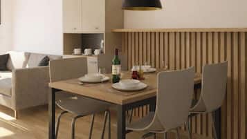 Appartement Premium | Coin séjour | Télévision