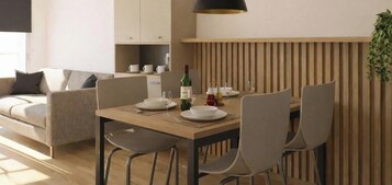 Apartamento Premium | Zona de estar | Una televisión