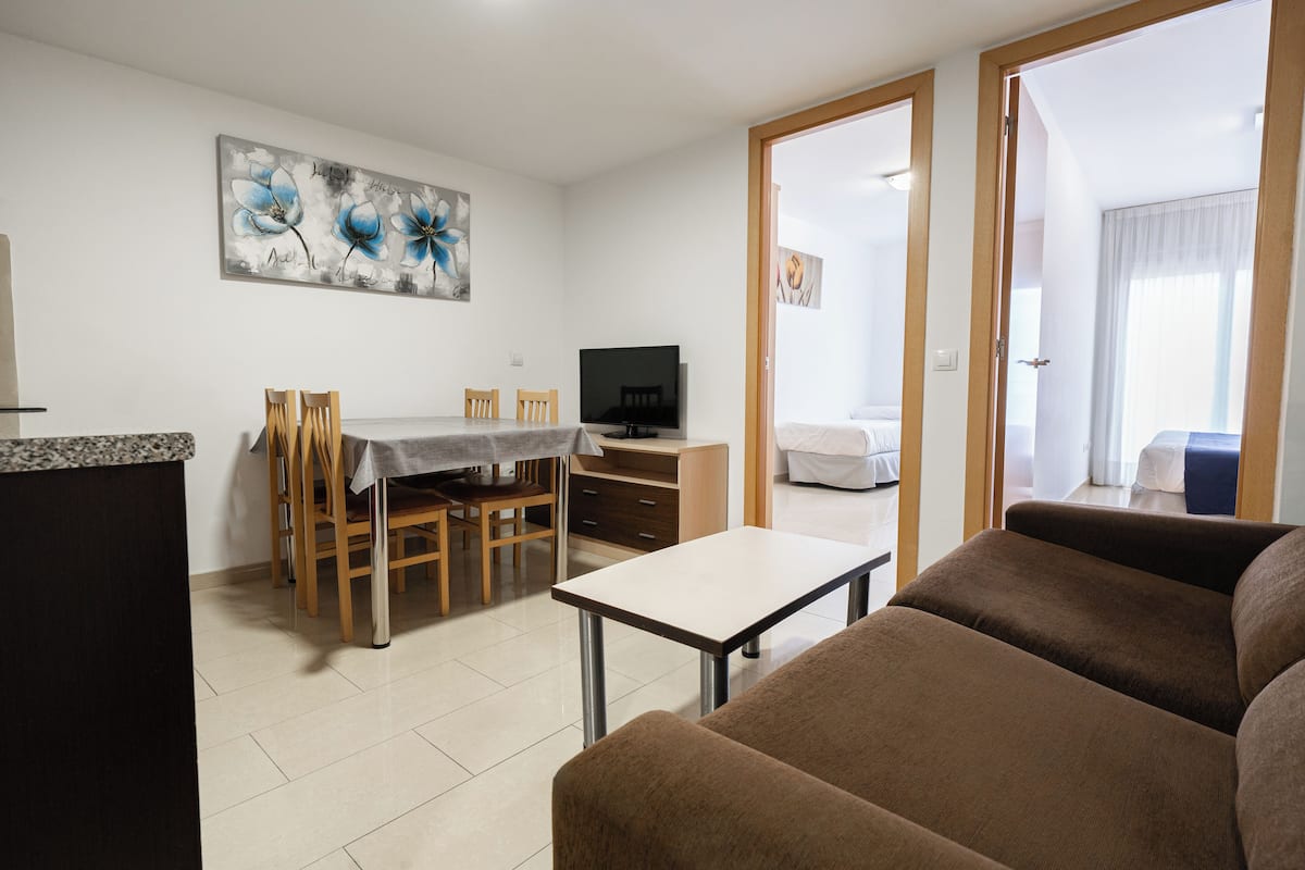 Apartment, 1 Bedroom, Balcony (2-4 adults) | Living area | TV