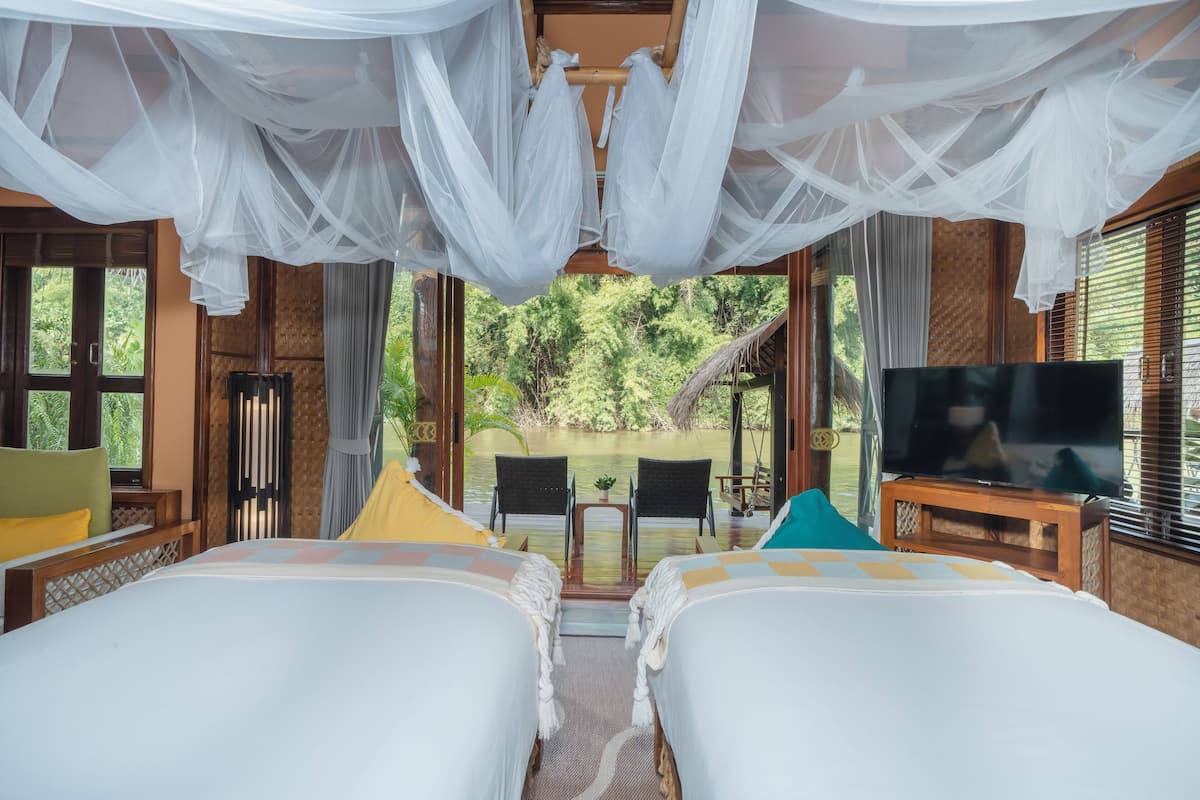 Villa (Floating with Dinner+ Breakfast ) | 1 dormitorio, ropa de cama de alta calidad, minibar y caja fuerte