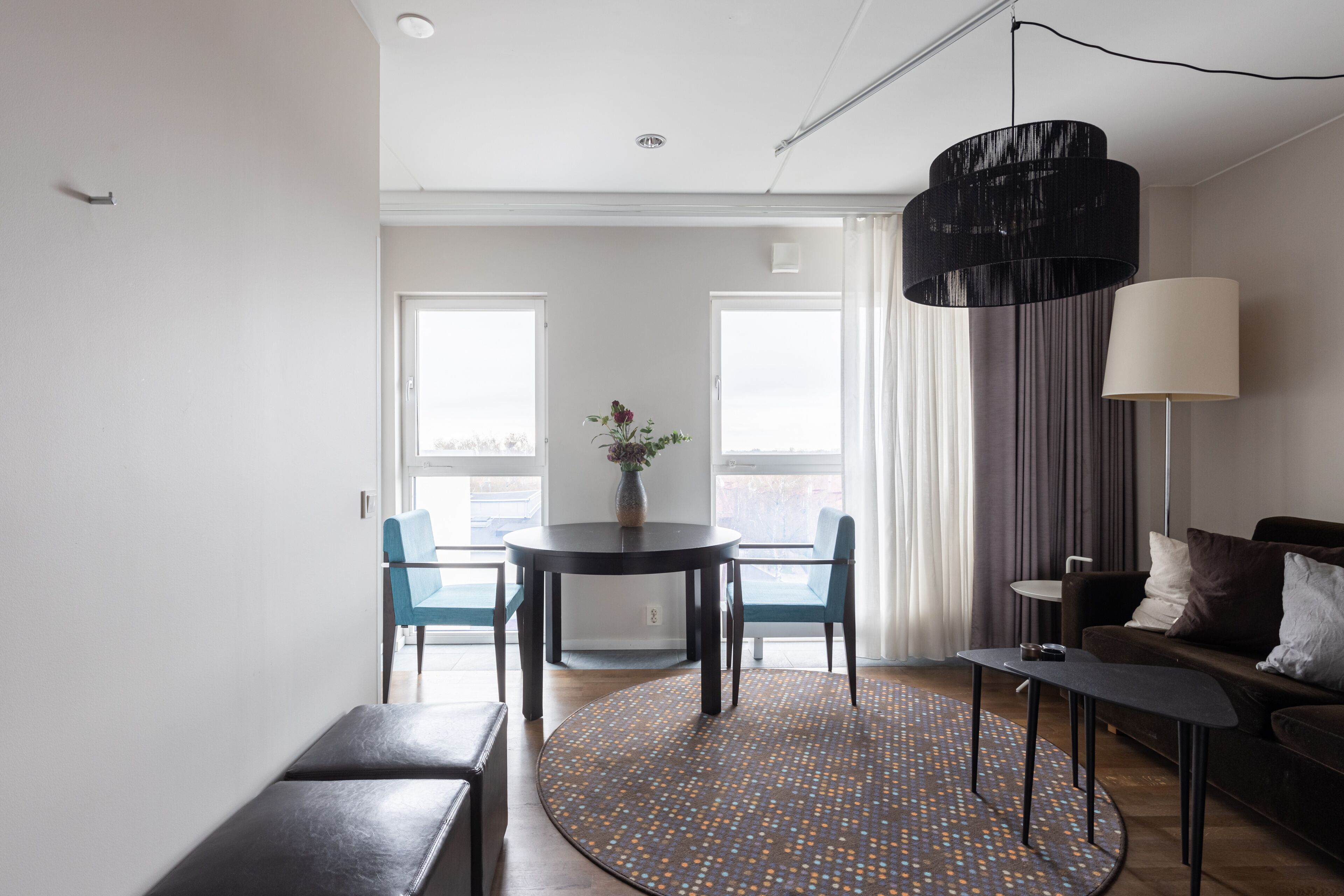 studio suite with balcony | premium bedding, laptop workspace, blackout curtains, free wifi