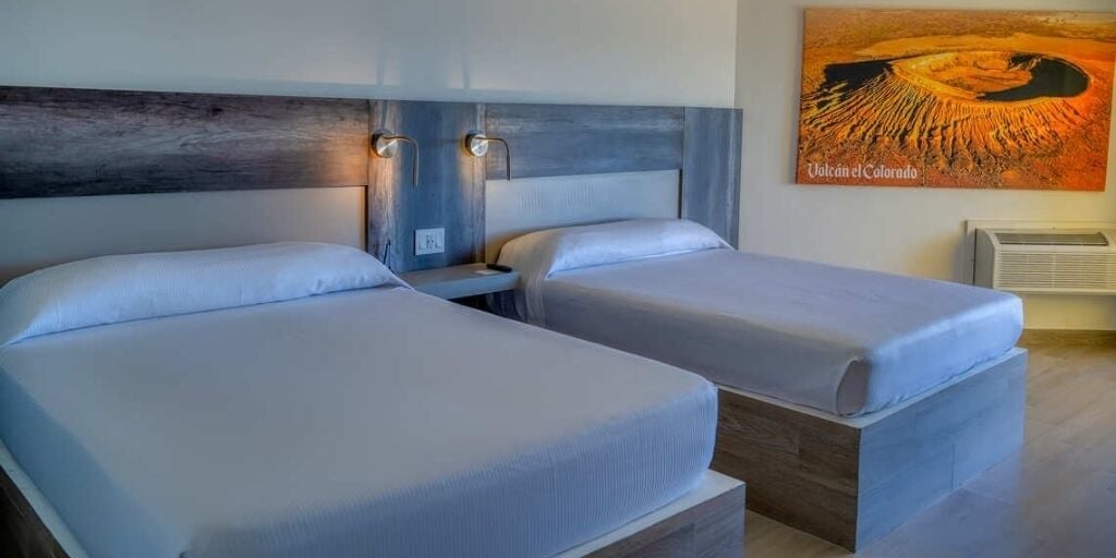 Standard Double Room, Partial Sea View | Laptop workspace, blackout drapes, iron/ironing board, free WiFi