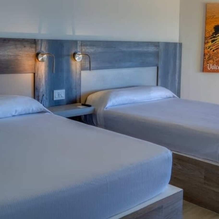 Standard Double Room, Partial Sea View | Laptop workspace, blackout drapes, iron/ironing board, free WiFi