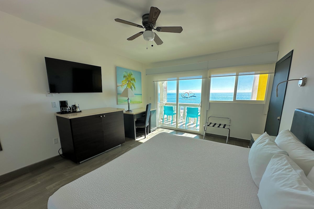 Comfort Room, Ocean View | Laptop workspace, blackout drapes, iron/ironing board, free WiFi