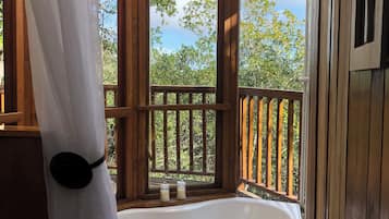 Deluxe Tent | Bathroom | Combined shower/tub, deep soaking tub, free toiletries, hair dryer